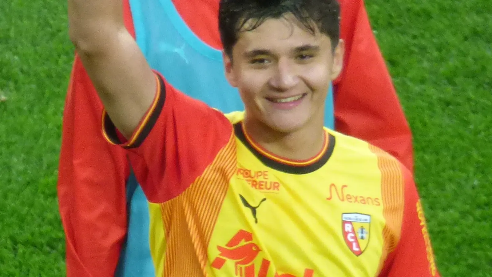 Abdukodir Khusanov on a football pitch
