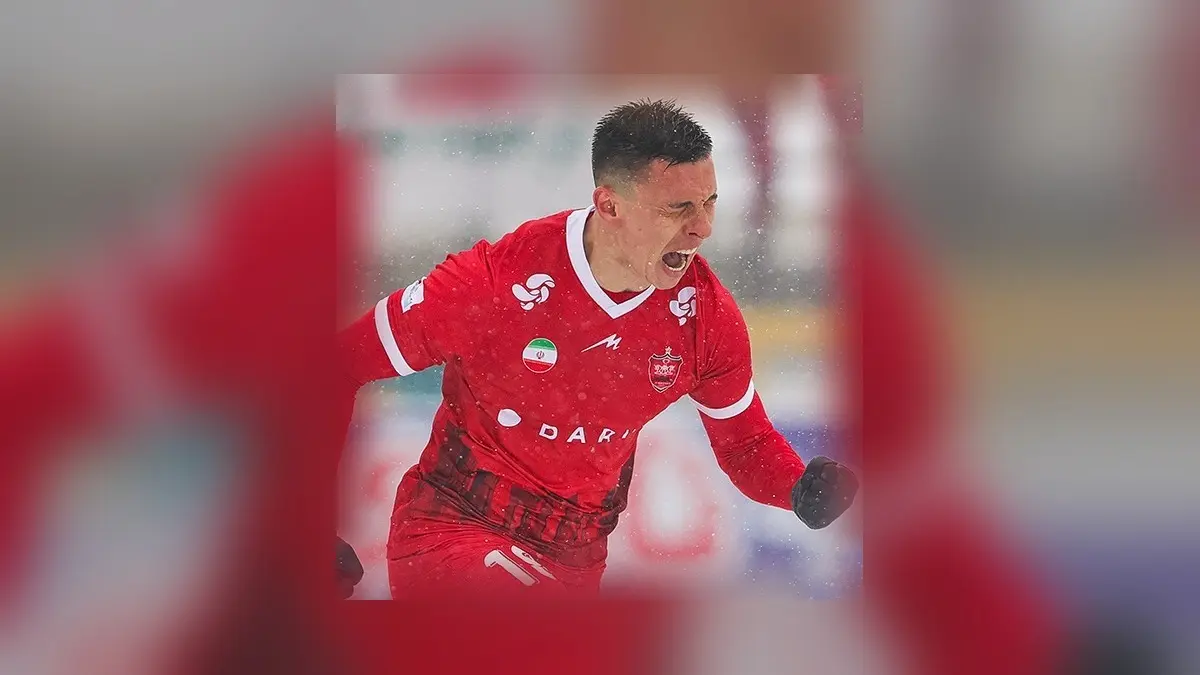 Igor Sergeev wearing the kit of Iranian club Persepolis