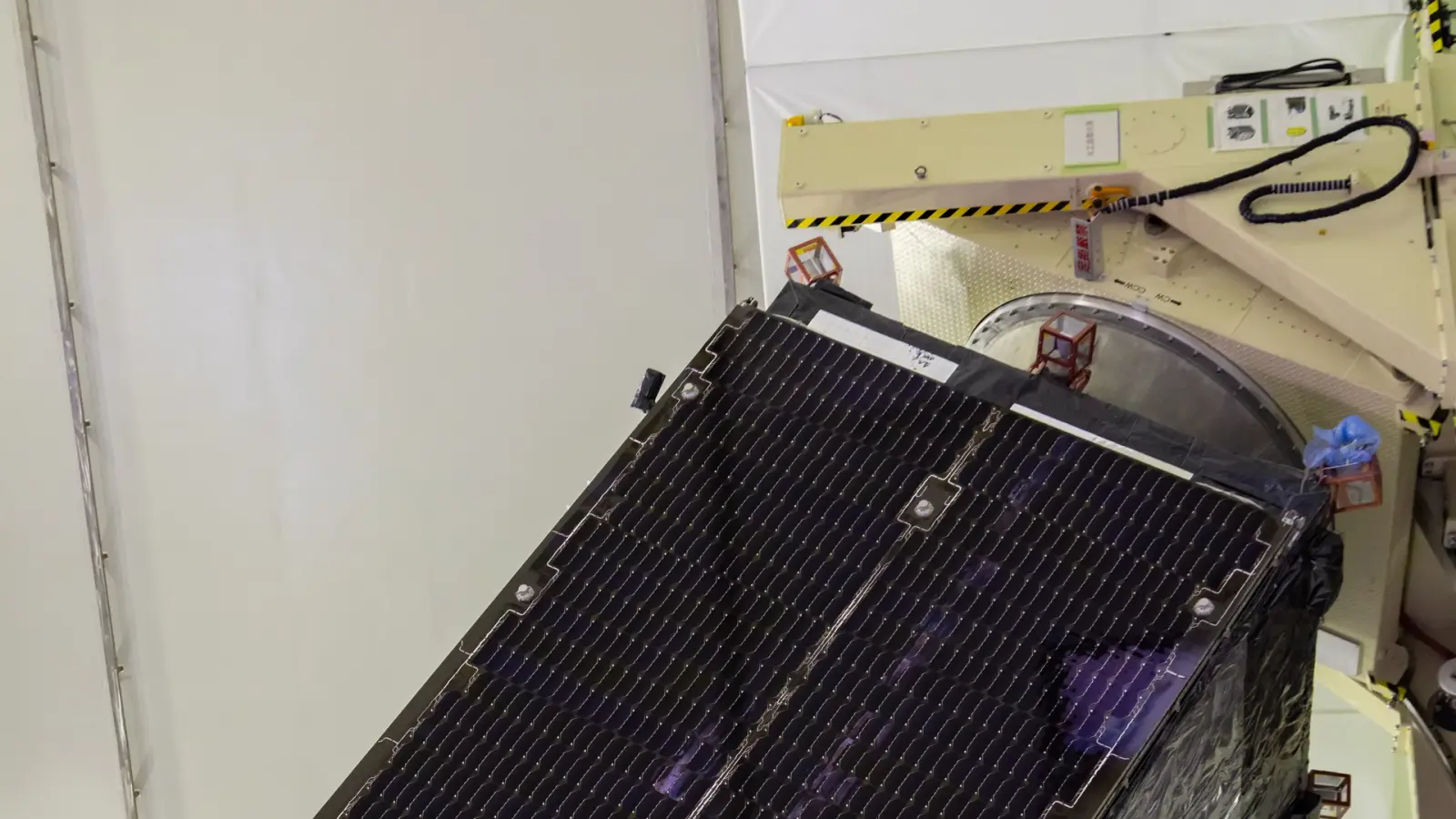 Michibiki-7 navigation satellite inside an assembly facility