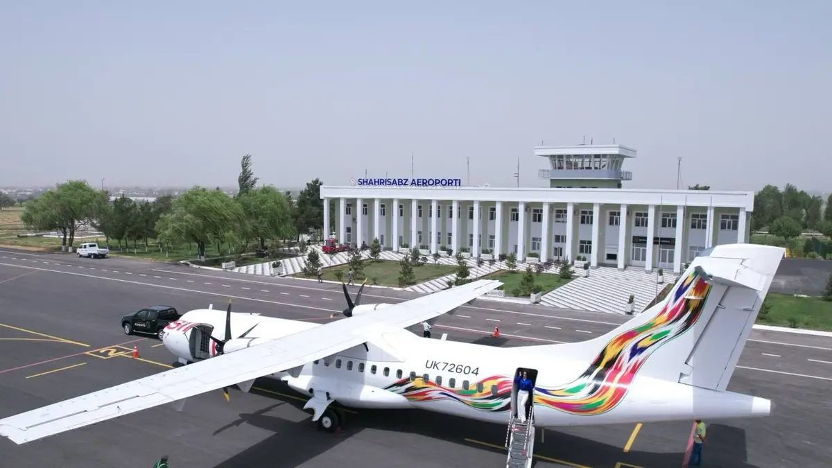 An aircraft and the terminal at Shahrisabz Airport, archive photo