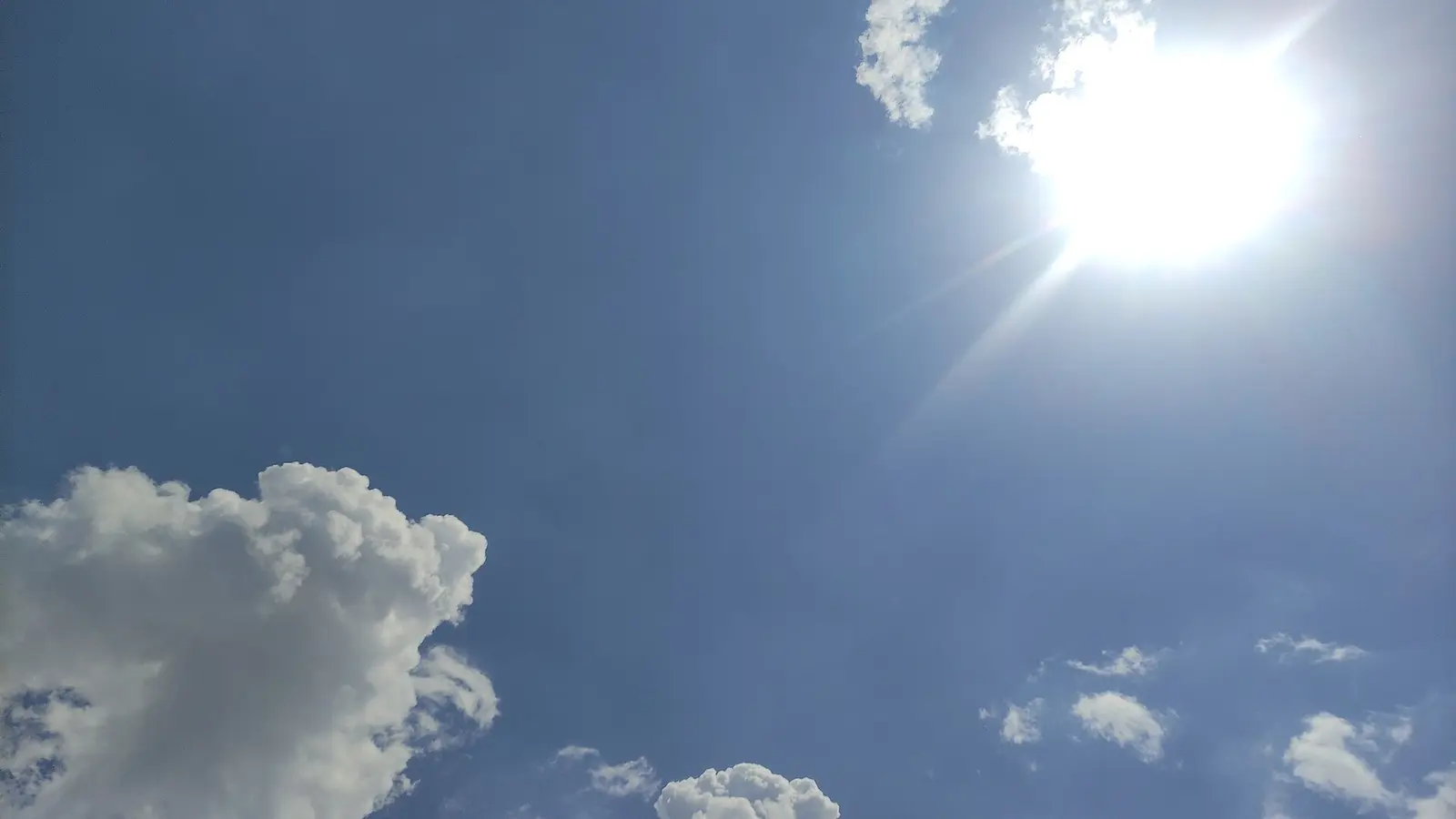 Sun and clouds in the sky above Tashkent