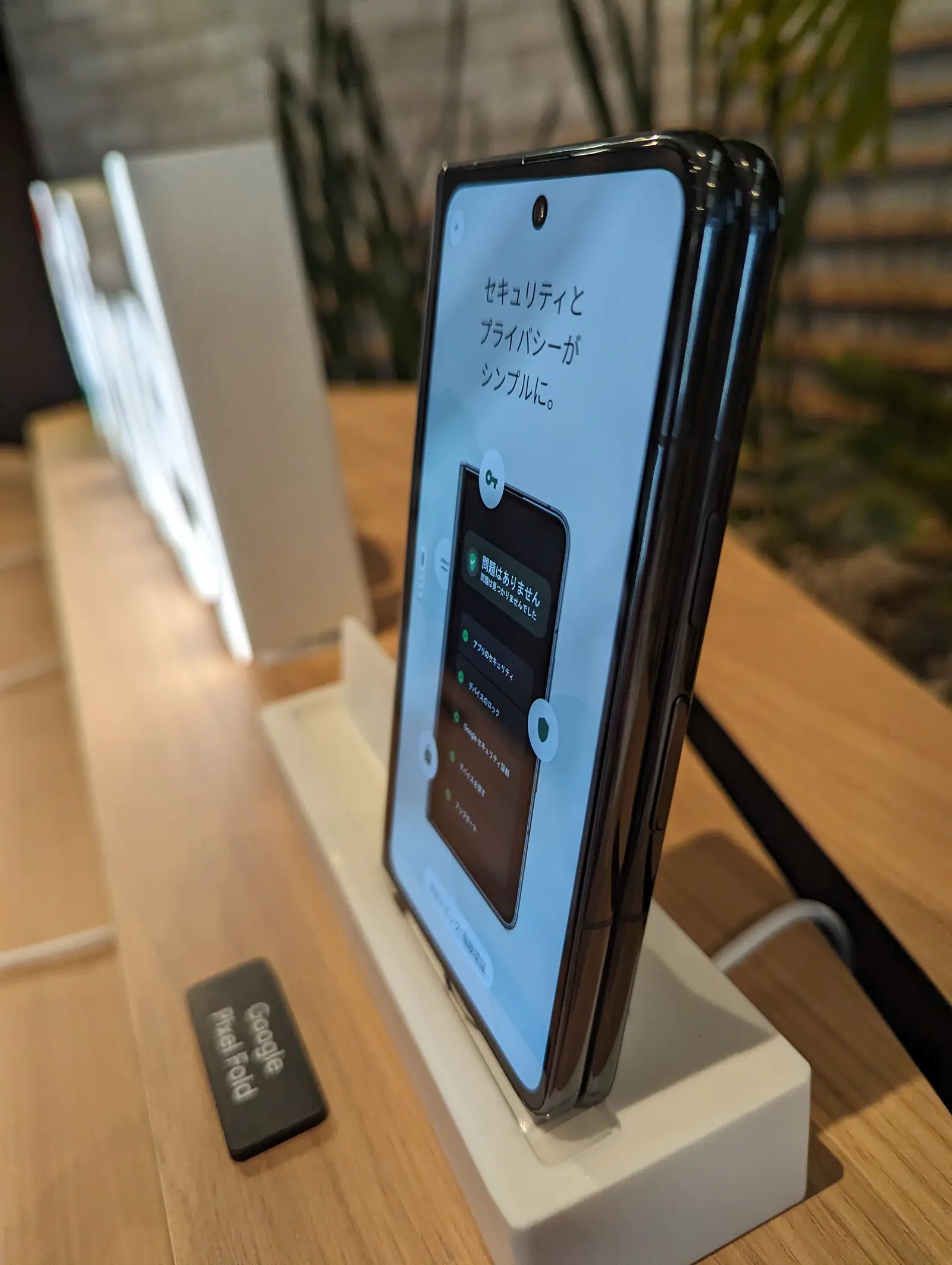 A foldable Google Pixel Fold smartphone on display